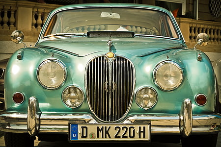 close-up photo of teal car thumbnail