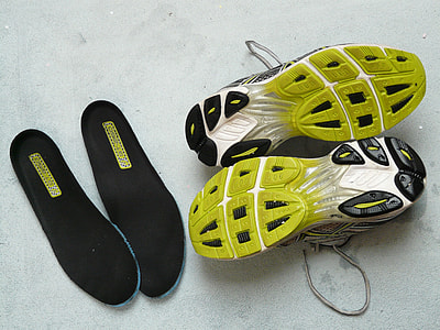 pair of green-white-and-black running shoes thumbnail