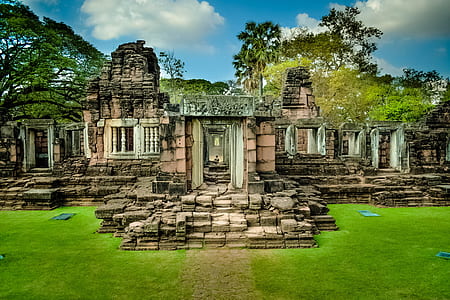 architectural photography of brown stone temple thumbnail