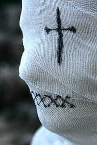 person wearing white face bandage thumbnail