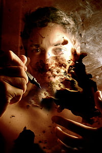 macro photography of male holding fountain pen thumbnail