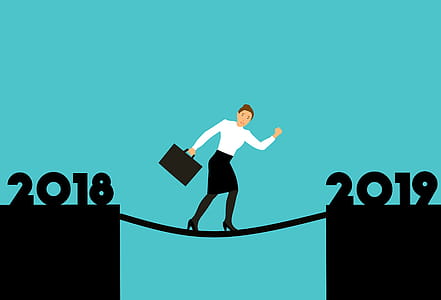 Business man crossing into the new year - 2019 thumbnail