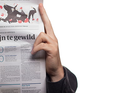 person holding newspaper thumbnail