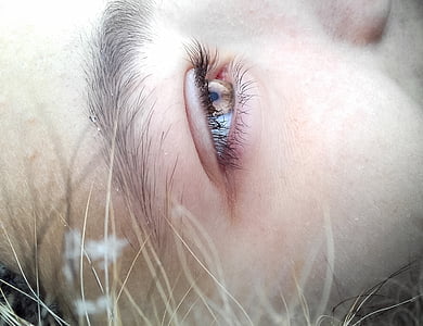 close up photography of eye thumbnail