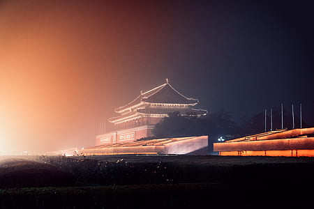 brown wooden house during night thumbnail