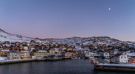 houses near sea and mountains thumbnail