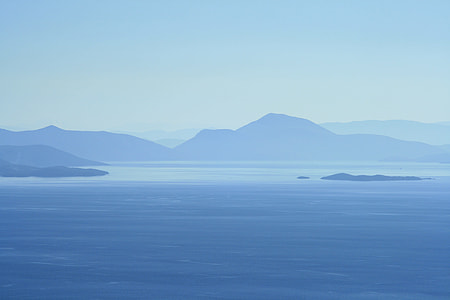 body of water near mountain thumbnail