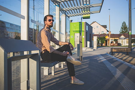 man sitting on bench thumbnail