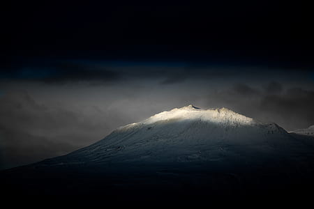 white mountain with clouds thumbnail