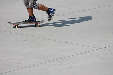man riding skateboard during daytime thumbnail