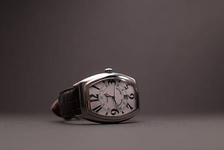 rectangular silver-colored analog watch reading 12:39 thumbnail