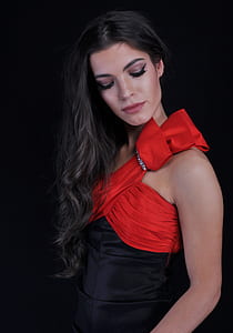 woman wearing red and black single-strap dress thumbnail