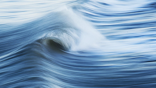 timelapse photography of beach wave during daytime thumbnail