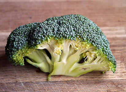 Green Broccoli Vegetable on Brown Wooden Table thumbnail