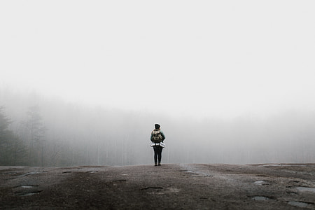 person standing near cliff thumbnail