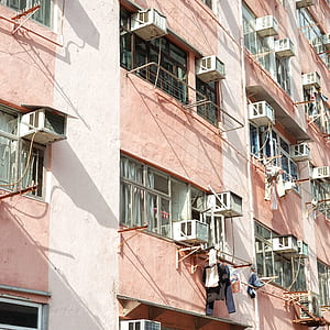 concrete building with air conditioners thumbnail