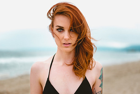 woman in black bikini top thumbnail