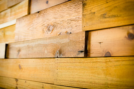 selective focus photography of brown wood plank thumbnail