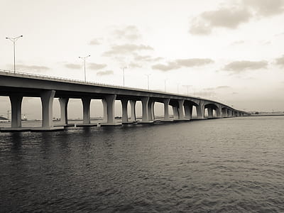 White and Gray Bridge on Body of Water thumbnail