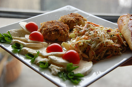 fried food and dessert on ceramic plate thumbnail