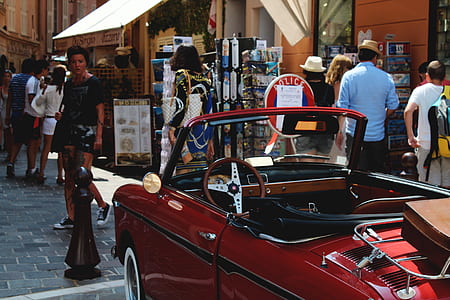 classic red convertible car on road thumbnail