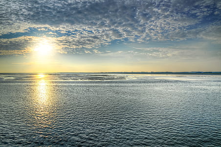 Aerial photography of sea and cloud during daytime thumbnail