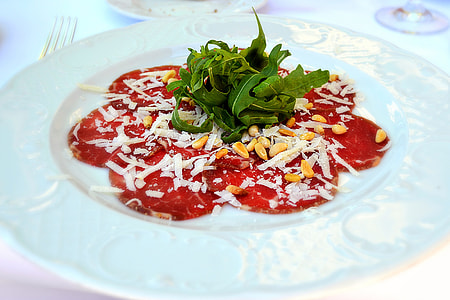 salad with red sauce on plate thumbnail