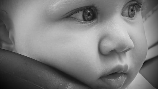 grayscale photography of baby's face thumbnail