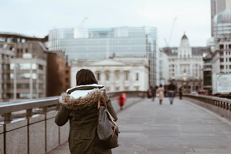 woman walking on road thumbnail
