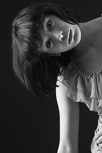 grayscale photography of woman in short-sleeved dress thumbnail