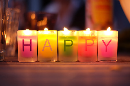 selective focus photo of five lighted candles thumbnail
