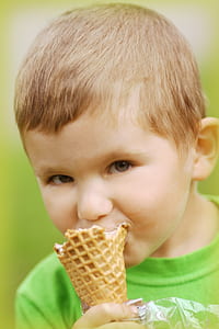 boy biting ice cream cone thumbnail