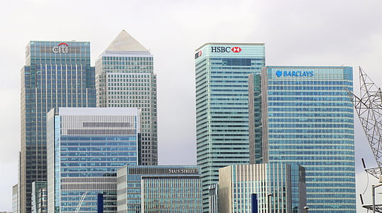 concrete buildings under clear sky thumbnail