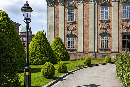 pathway leading to European styled building thumbnail