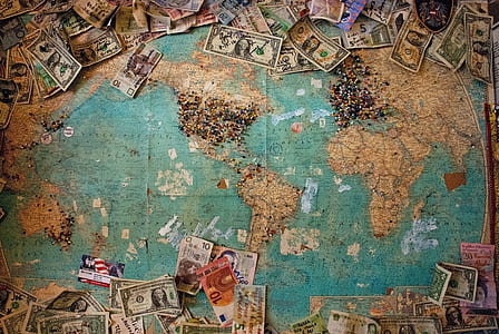 world map surrounded by dollar bills thumbnail