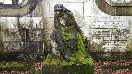 female concrete statue during daytime thumbnail