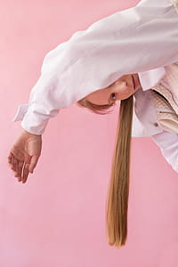 Woman Wearing White and Gray Jacket thumbnail