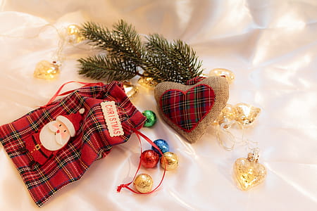 red and back plaid pouch bear baubles on bed thumbnail