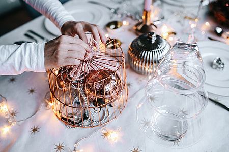 Hands Decorating Christmas Table thumbnail