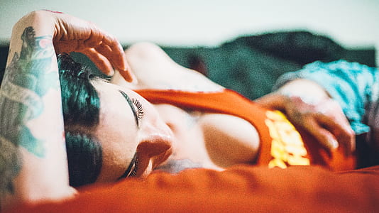 woman lying on bed thumbnail