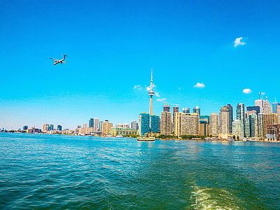 city view with body of water photography thumbnail