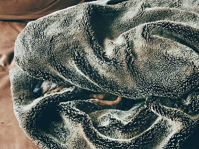 black fleece cloth on brown cloth thumbnail