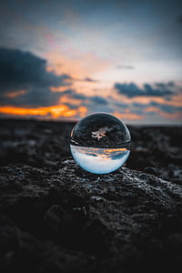 mirror ball on stone during golden hour thumbnail