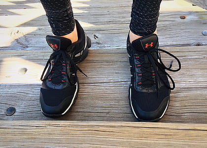 person wearing Under Armour running shoes thumbnail