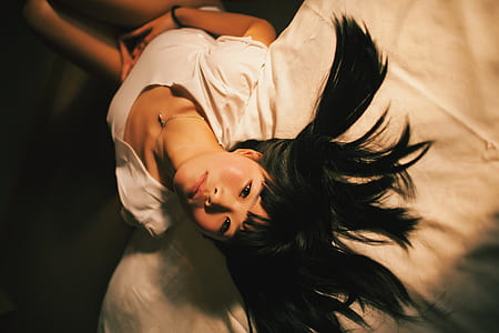 woman wearing white top thumbnail