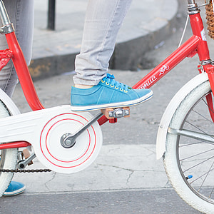 person wearing sneakers riding bike thumbnail