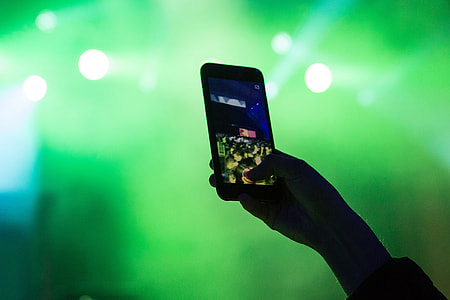 Using mobile smartphone at music festival thumbnail