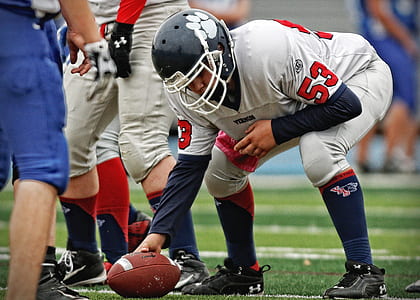 football player preparing for play thumbnail