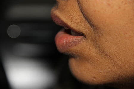 close up photo of person's mouth thumbnail