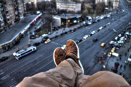person wearing pair of brown suede shoes thumbnail